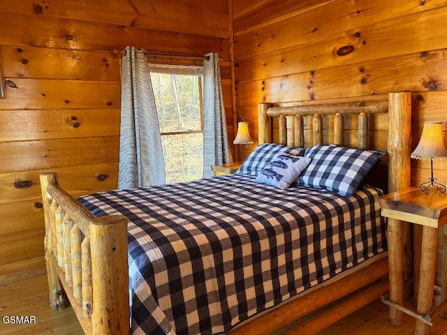 bedroom featuring hardwood / wood-style flooring