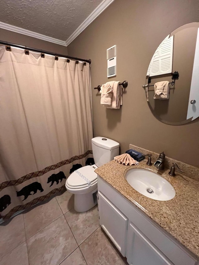 bathroom with tile patterned floors, toilet, crown molding, a textured ceiling, and vanity