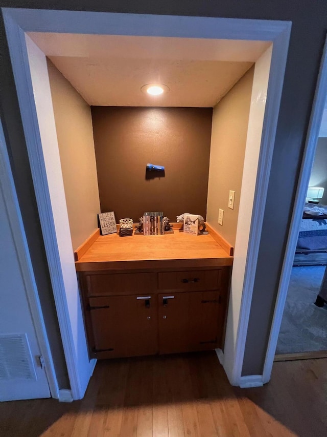 bathroom featuring vanity and hardwood / wood-style floors