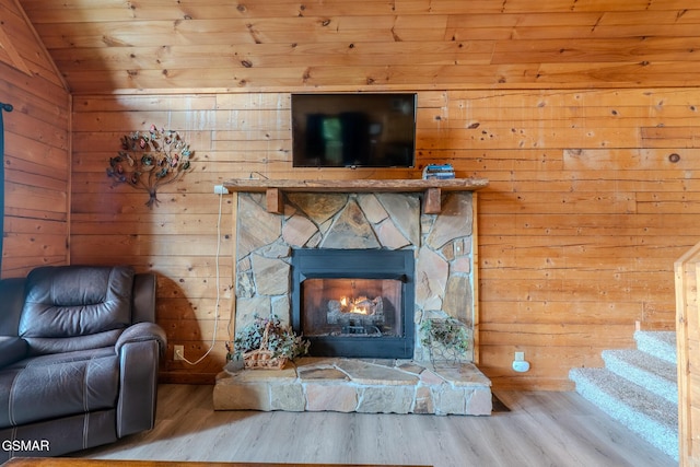 1910 E Mountain View Way, Sevierville, TN 37876 - living room with wood ceiling, wood finished floors, lofted ceiling, wooden walls, and a fireplace
