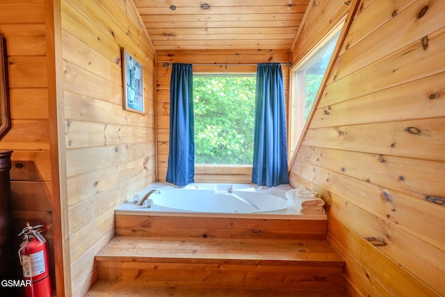 1910 E Mountain View Way, Sevierville, TN 37876 - full bath with wood walls, healthy amount of natural light, a garden tub, and wood ceiling