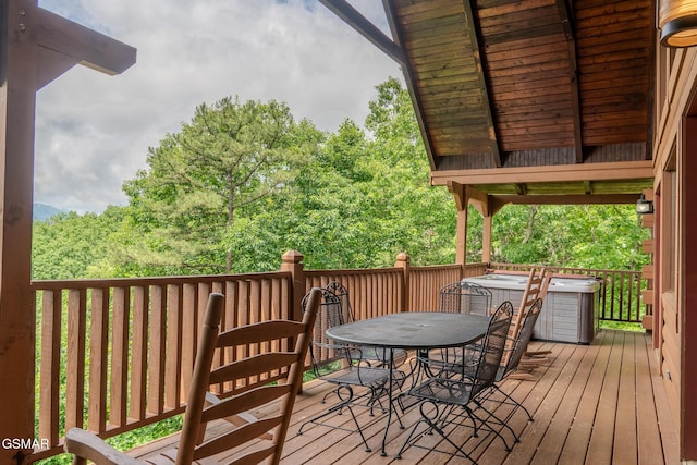 1910 E Mountain View Way, Sevierville, TN 37876 - wooden terrace with outdoor dining space, a hot tub, and central air condition unit