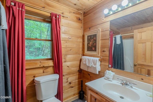 1910 E Mountain View Way, Sevierville, TN 37876 - bathroom featuring toilet, wood walls, wooden ceiling, vanity, and a shower with curtain