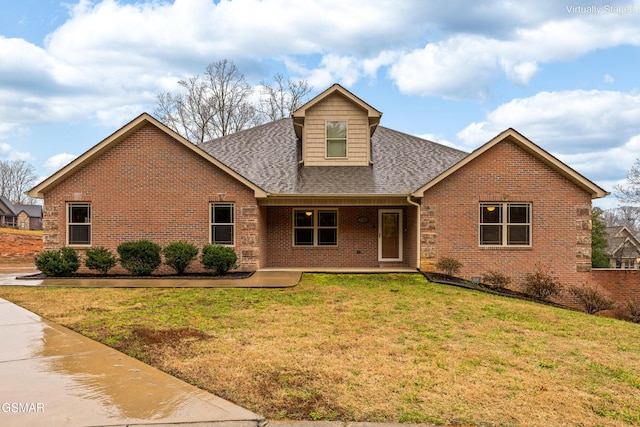 view of front facade with a front lawn