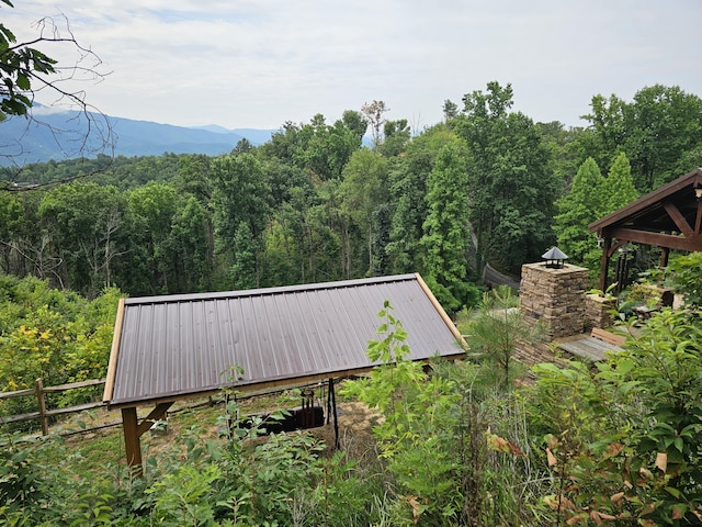 exterior space featuring a mountain view