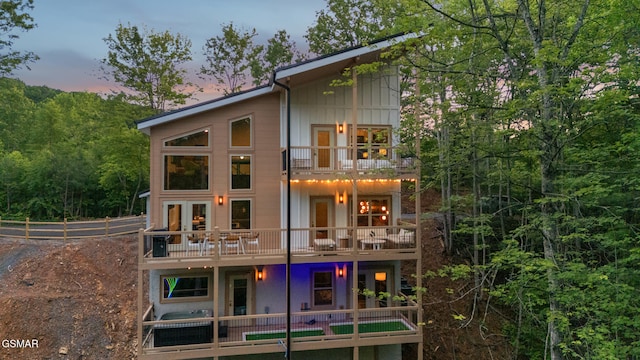 1928 Pine Ct, Sevierville, TN 37876 - rear view of property with a balcony and board and batten siding