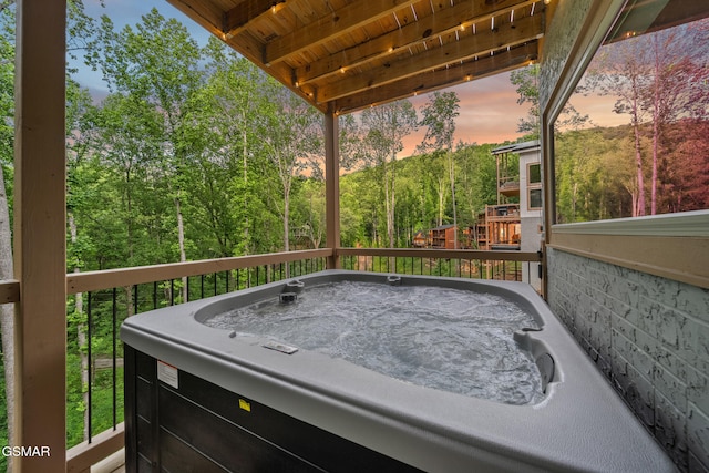 1928 Pine Ct, Sevierville, TN 37876 - view of patio / terrace featuring a hot tub and a deck