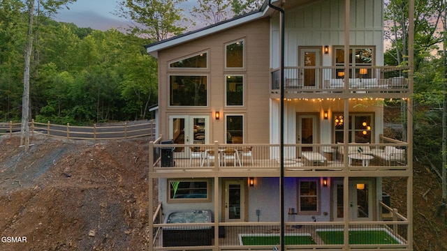 1928 Pine Ct, Sevierville, TN 37876 - back of house featuring a balcony and board and batten siding