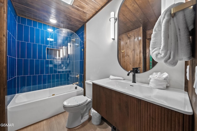 1928 Pine Ct, Sevierville, TN 37876 - full bath featuring toilet, wooden ceiling, vanity, wood finished floors, and washtub / shower combination