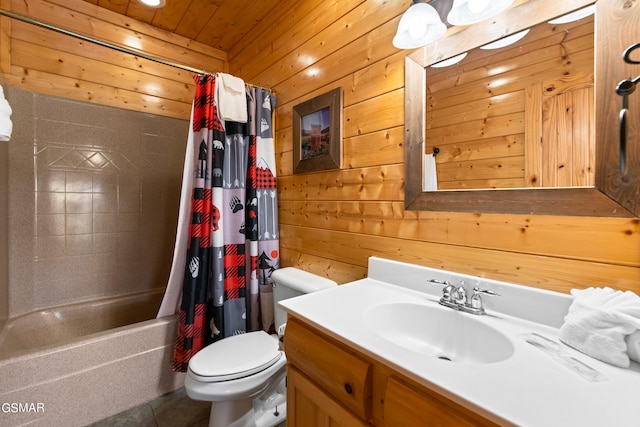 full bathroom with toilet, vanity, shower / tub combo with curtain, and wooden walls