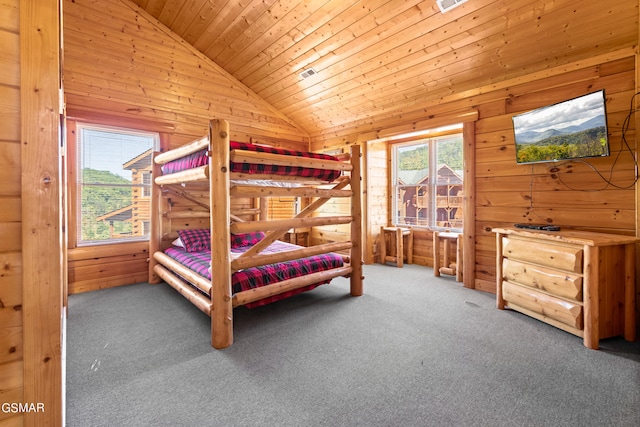 carpeted bedroom featuring high vaulted ceiling, wooden walls, and wood ceiling