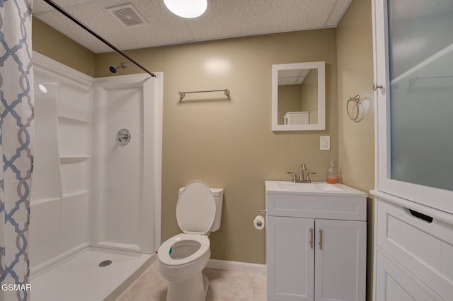 bathroom with toilet, vanity, and curtained shower