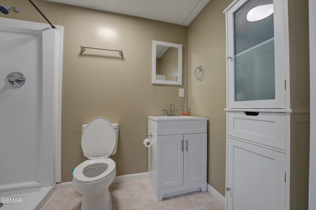 bathroom with a textured ceiling, toilet, vanity, and walk in shower