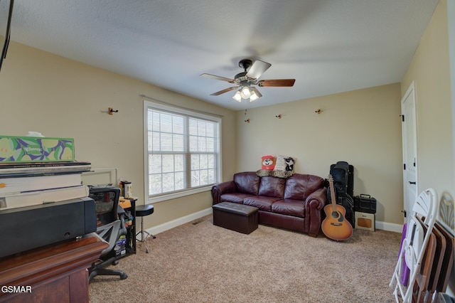 living room featuring light carpet and ceiling fan