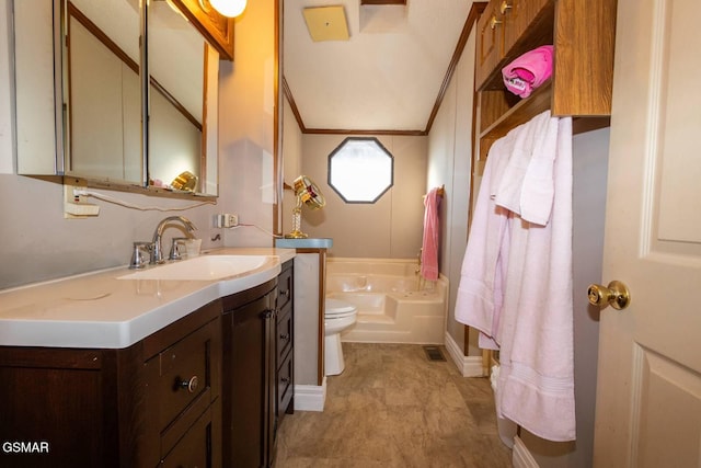 bathroom with vanity, toilet, and a bathtub