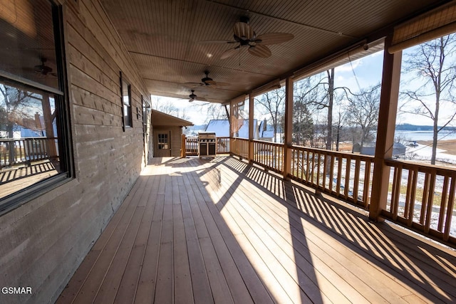 snow covered deck with ceiling fan