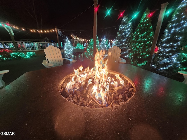 details featuring an outdoor fire pit