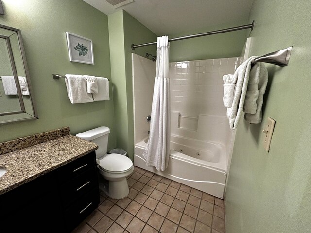 full bathroom featuring tile patterned flooring, vanity, toilet, and shower / bath combo with shower curtain