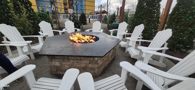 view of patio with a fire pit