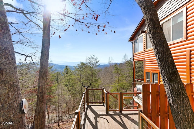 deck with a forest view