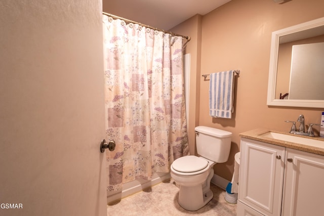 6119 Ridgeview Rd, Knoxville, TN 37918 - bathroom with toilet, vanity, tile patterned floors, and baseboards