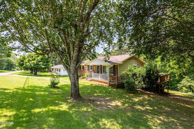 6119 Ridgeview Rd, Knoxville, TN 37918 - view of front of home with a front yard and brick siding