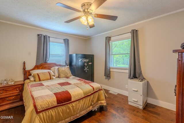 850 Fairground St, Cookeville, TN 38501 - living area with a barn door, dark wood-style floors, a fireplace, a textured ceiling, and ceiling fan