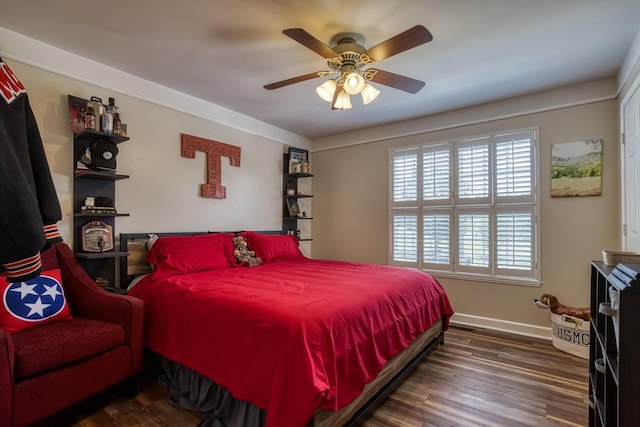 bedroom featuring ceiling fan and dark wood-type flooring