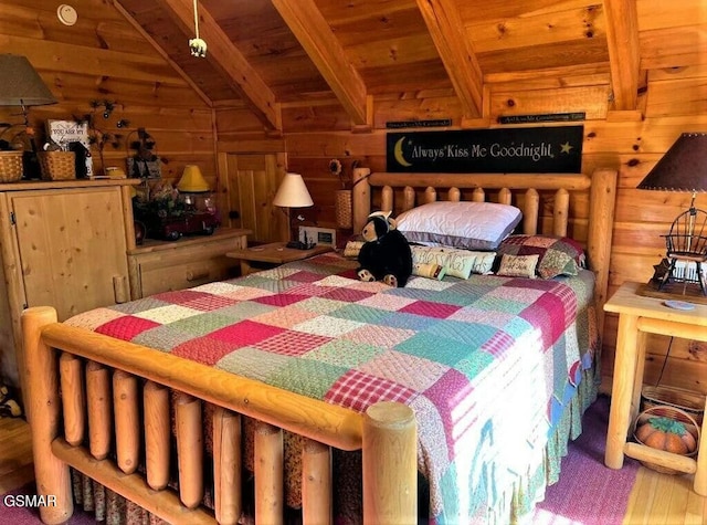 bedroom with wood walls, wooden ceiling, lofted ceiling with beams, and wood finished floors