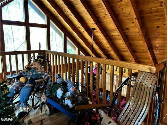 interior space featuring wood ceiling, vaulted ceiling with beams, and wood finished floors