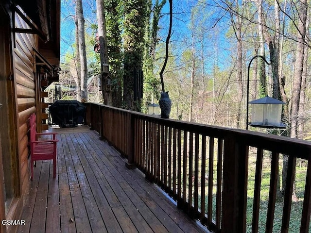 wooden deck with area for grilling