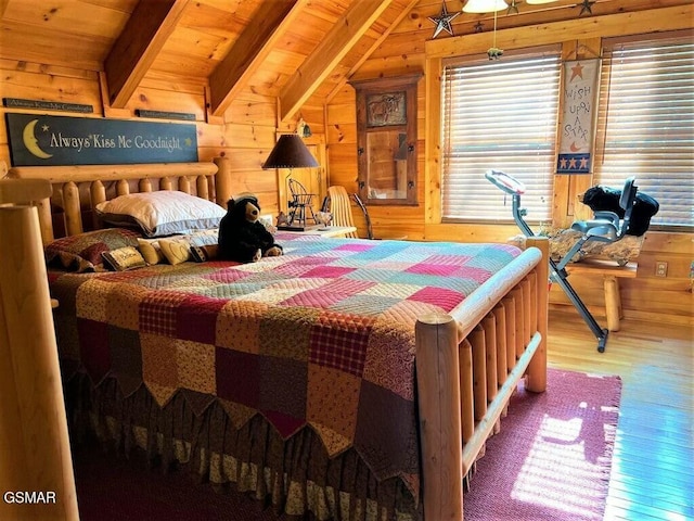 bedroom featuring wood ceiling, wooden walls, vaulted ceiling with beams, and wood finished floors