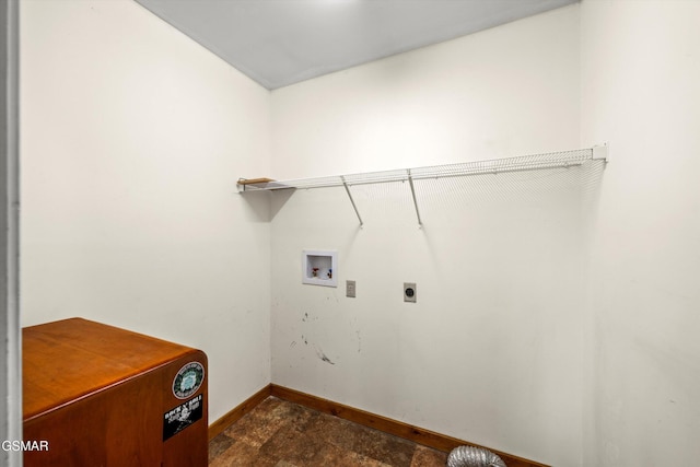 laundry room featuring hookup for a washing machine, baseboards, laundry area, electric dryer hookup, and stone finish floor