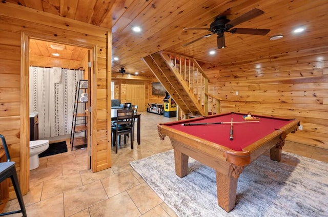 recreation room featuring wooden walls, wooden ceiling, light tile patterned flooring, billiards, and ceiling fan