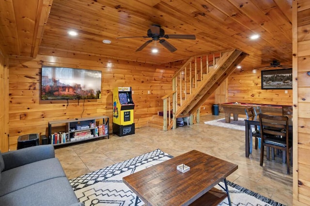 living room with pool table, ceiling fan, wooden walls, and wooden ceiling