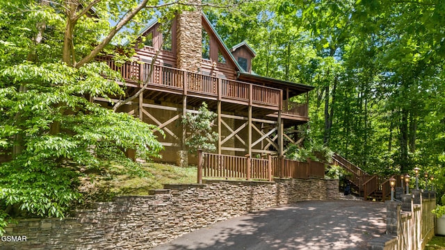 915 Statham Way, Gatlinburg, TN 37738 - view of side of property featuring log siding, stairway, a deck, and a chimney