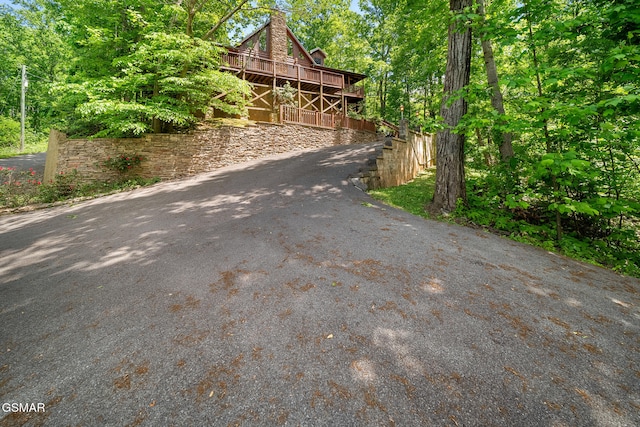 915 Statham Way, Gatlinburg, TN 37738 - back of house at dusk with a wooden deck