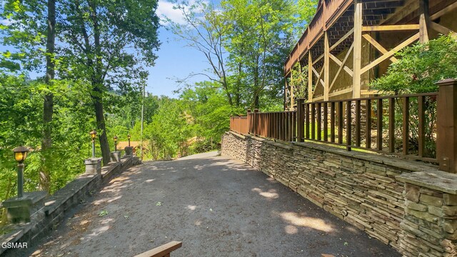 915 Statham Way, Gatlinburg, TN 37738 - view of property exterior with driveway and a chimney