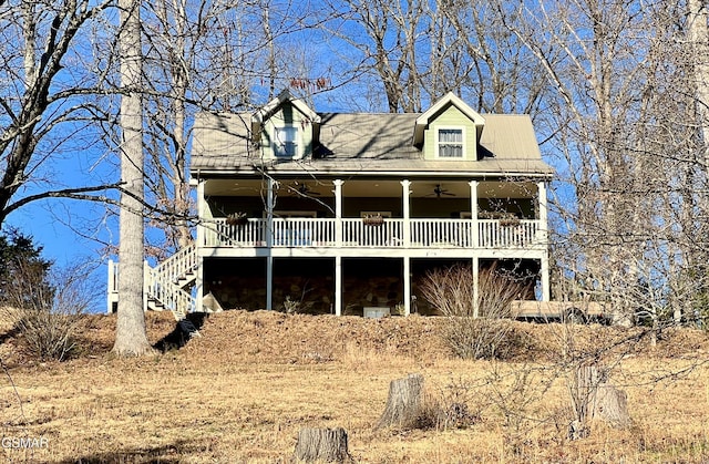 view of front of home featuring ceiling fan