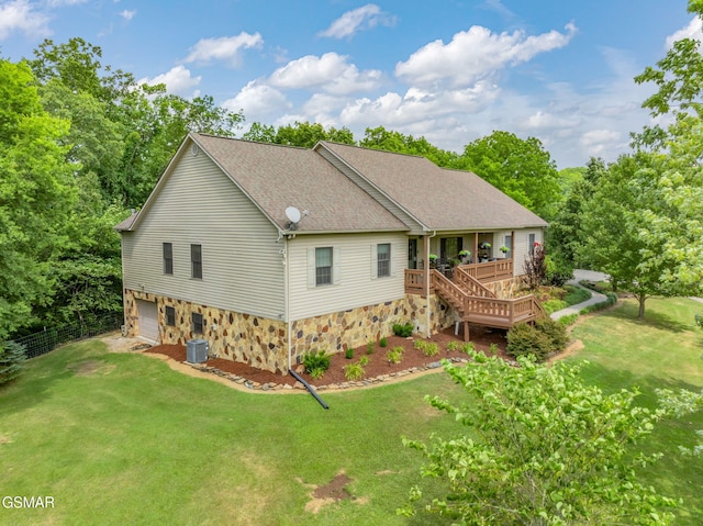 1668 Deerwood Rd, Newport, TN 37821 - back of house with stone siding, a garage, roof with shingles, and stairway