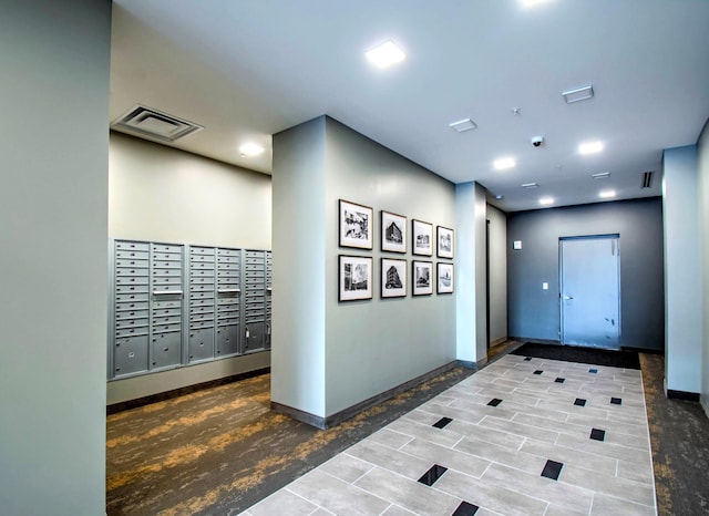 interior space with visible vents and mail area