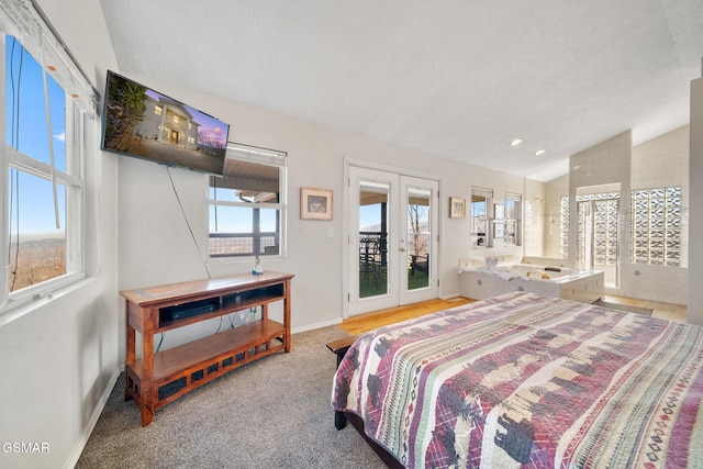 bedroom featuring french doors, lofted ceiling, a textured ceiling, carpet floors, and access to exterior