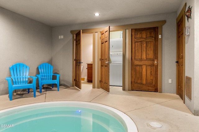 view of pool with washer / clothes dryer