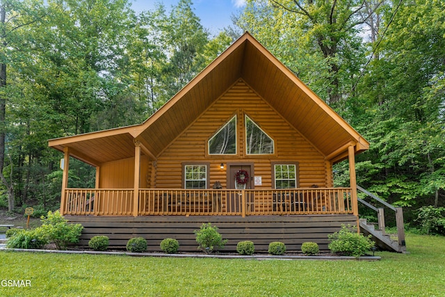 3040 Grassy Branch Loop, Sevierville, TN 37876 - cabin featuring log exterior, a front lawn, stairs, and a deck