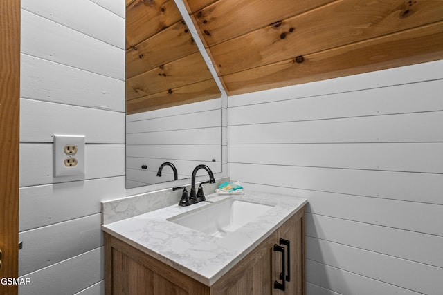 3040 Grassy Branch Loop, Sevierville, TN 37876 - bathroom with vanity and wood walls