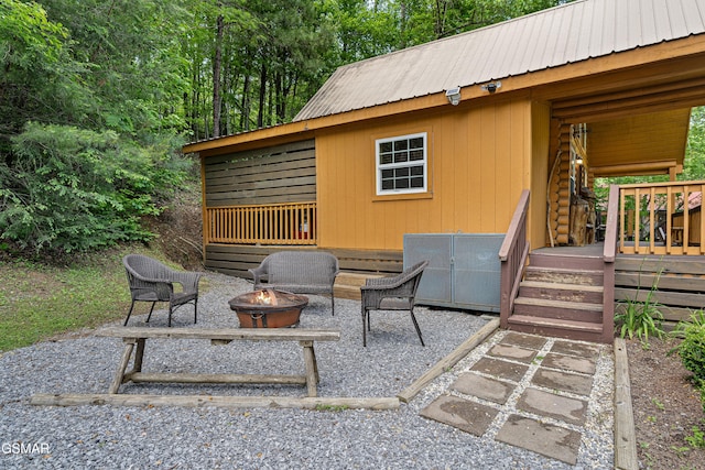 3040 Grassy Branch Loop, Sevierville, TN 37876 - view of patio featuring a fire pit and a wooden deck