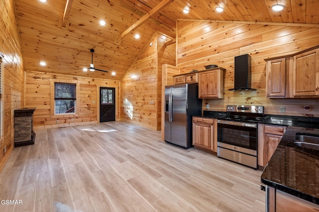 kitchen with stainless steel appliances, wooden walls, wood ceiling, and wall chimney range hood