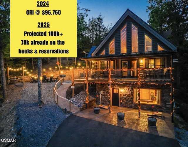back of property featuring a patio