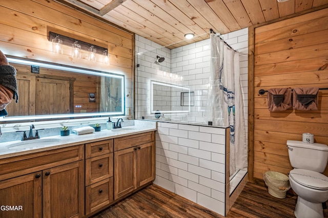 bathroom with wood walls, hardwood / wood-style flooring, vanity, walk in shower, and wooden ceiling