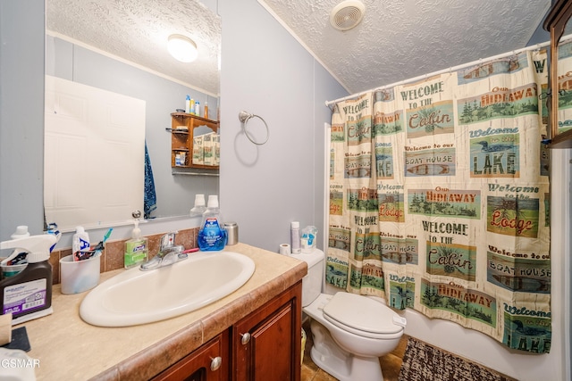 full bathroom featuring shower / bathtub combination with curtain, vanity, toilet, and a textured ceiling